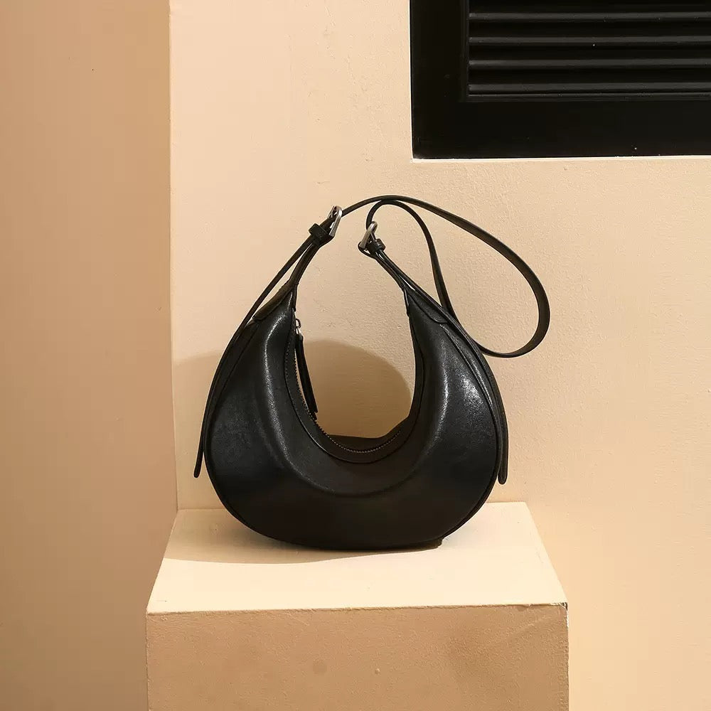 First layer cowhide diagonal cross dumpling bag, new genuine leather niche single shoulder practical commuting natural drop pattern cowhide crescent bag
